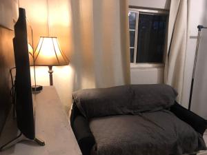 Posezení v ubytování Habitación mediana en casa grande