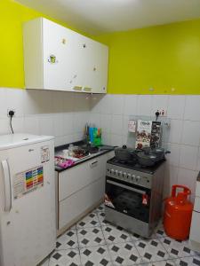 Η κουζίνα ή μικρή κουζίνα στο D&H homes