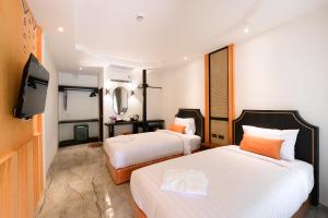 Televisyen dan/atau pusat hiburan di Noppharat Krabi Resort