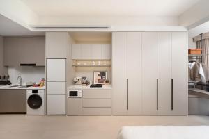 Nanjing Olympic Sports Center Suisse Place Apartment Hotel的厨房或小厨房