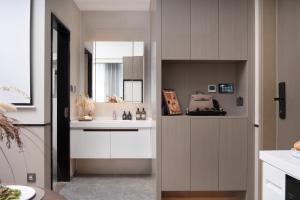 Nanjing Olympic Sports Center Suisse Place Apartment Hotel的厨房或小厨房