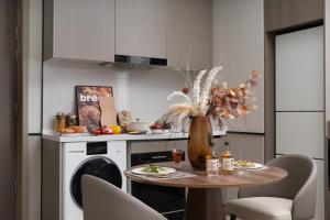 Nanjing Olympic Sports Center Suisse Place Apartment Hotel的厨房或小厨房