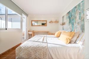 Un pat sau paturi într-o cameră la Can 32 Apartamento 2 habitaciones