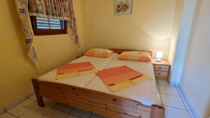 Postel nebo postele na pokoji v ubytování Apartments Dario