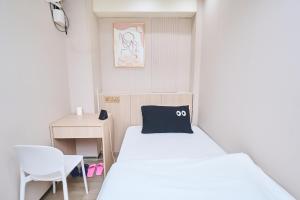 香港智能居家旅館雙人入住首選客房内的一张或多张床位