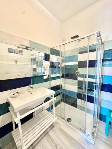 a bathroom with a sink and a shower at Belvedere Hotel-B&B in Palinuro +106 photos