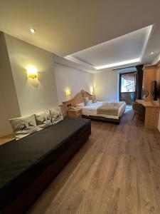Posteľ alebo postele v izbe v ubytovaní Hotel Isolabella Wellness