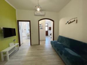 Телевизор и/или развлекательный центр в Casa Vacanze Merletto