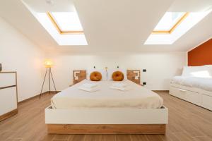 Postel nebo postele na pokoji v ubytování Exclusive Rooftop vicino Milano e Rho-fiera