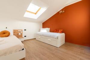 Postel nebo postele na pokoji v ubytování Exclusive Rooftop vicino Milano e Rho-fiera