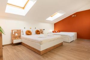 Postel nebo postele na pokoji v ubytování Exclusive Rooftop vicino Milano e Rho-fiera