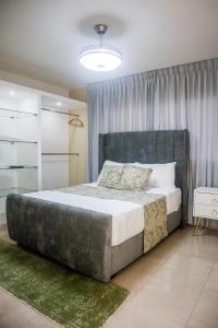 Postel nebo postele na pokoji v ubytování Residencial Nany
