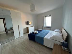 Кровать или кровати в номере Casa Vacanze Merletto