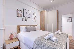 Postel nebo postele na pokoji v ubytování Vt recién renovada en Zabalburu