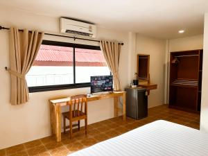 TV a/nebo společenská místnost v ubytování Bounty Resort