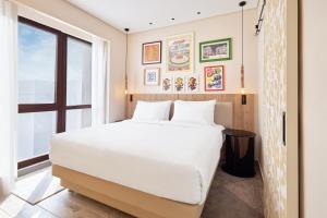 Postel nebo postele na pokoji v ubytování Hyatt Centric Cairo West