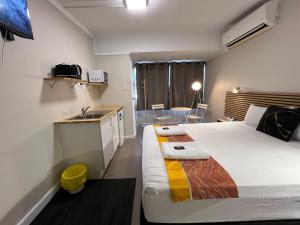 Postel nebo postele na pokoji v ubytování Kalua Motel