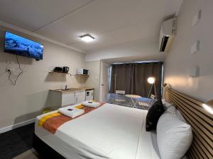 Postel nebo postele na pokoji v ubytování Kalua Motel