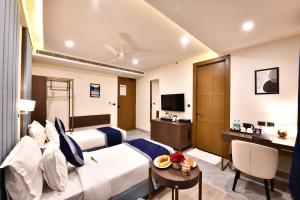 TV at/o entertainment center sa Click Collection Grand Gateway Varanasi