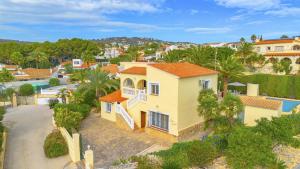 an aerial view of a house with a pool at Villa Carola - PlusHolidays in Ifach