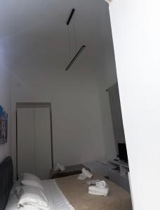 A bed or beds in a room at La casetta mape
