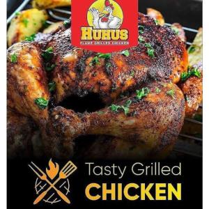 a packet of chicken on top of a grill at One bedroom apartment Aviv in Nairobi