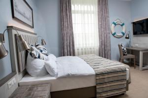 Letto o letti in una camera di Hotel am Prinzengarten, inklusive AlbCard