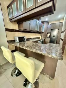 Kuchnia lub aneks kuchenny w obiekcie Los Boliches, modernos aptos 1 y 2 Dormitorios fantástica ubicación