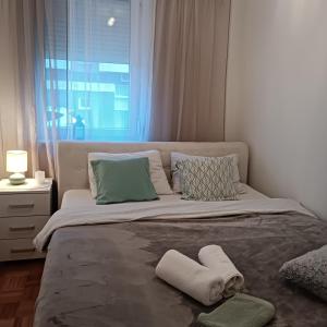 Ένα ή περισσότερα κρεβάτια σε δωμάτιο στο Ellena apartment