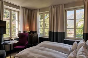 Postel nebo postele na pokoji v ubytování A-ROSA Collection Straubinger Grand Hotel Bad Gastein + 37 fotografií