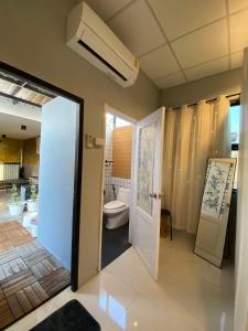 Η κουζίνα ή μικρή κουζίνα στο 89 Bed & Studio Hostel
