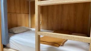 Postel nebo postele na pokoji v ubytování Pepitu Dormitory By Sandat