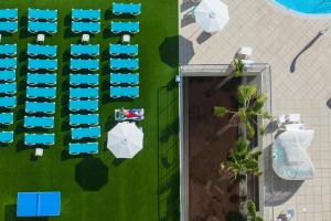 an overhead view of a parking lot with a fire truck at Port Benidorm Hotel & Spa 4* Sup in Benidorm