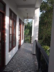 a hallway of a house with doors and a walkway at Jb Villa in Bona Vista +14 photos