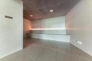 an empty room with a white wall and a shelf at Port Benidorm Hotel & Spa 4* Sup in Benidorm