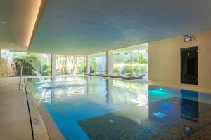 a swimming pool in a house with a swimming pool at Port Benidorm Hotel & Spa 4* Sup in Benidorm