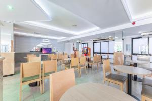 Reštaurácia alebo iné gastronomické zariadenie v ubytovaní Port Vista Oro