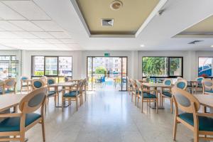 Reštaurácia alebo iné gastronomické zariadenie v ubytovaní Port Vista Oro