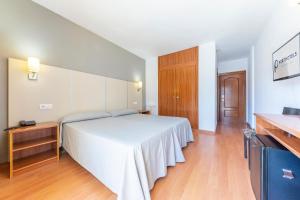 Posteľ alebo postele v izbe v ubytovaní Port Vista Oro