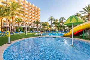 a pool at the resort with a slide and a slideshare at Port Denia in Denia