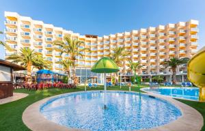 a resort with a pool and a large building at Port Denia in Denia +39 photos