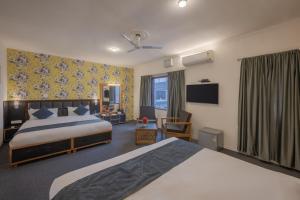 Postel nebo postele na pokoji v ubytování Echor Kashmir Holidays Resort Srinagar