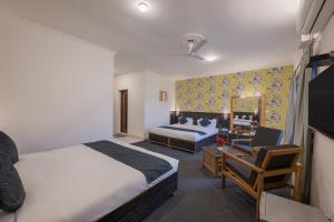 Postel nebo postele na pokoji v ubytování Echor Kashmir Holidays Resort Srinagar