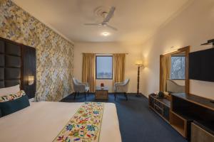 Postel nebo postele na pokoji v ubytování Echor Kashmir Holidays Resort Srinagar