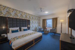 Postel nebo postele na pokoji v ubytování Echor Kashmir Holidays Resort Srinagar