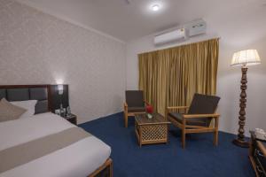 Postel nebo postele na pokoji v ubytování Echor Kashmir Holidays Resort Srinagar