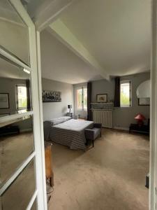 Ένα ή περισσότερα κρεβάτια σε δωμάτιο στο Chambre Joséphine