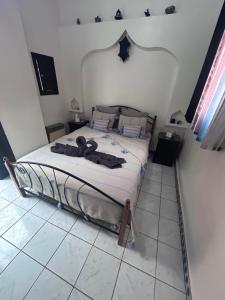 a bedroom with a bed in a room at Riad le pélican in Marrakech +37 photos