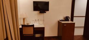 TV a/nebo společenská místnost v ubytování GOODWILL HOTEL