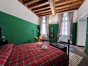 Postel nebo postele na pokoji v ubytování HOUSE, piazza castello